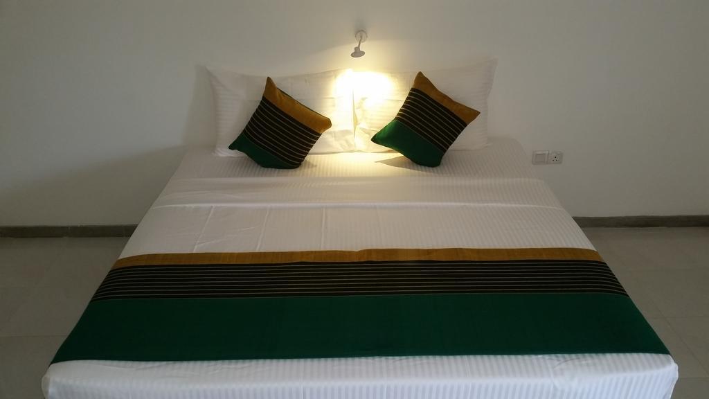 Apartmán Kutumbaya Anuradhápura Pokoj fotografie